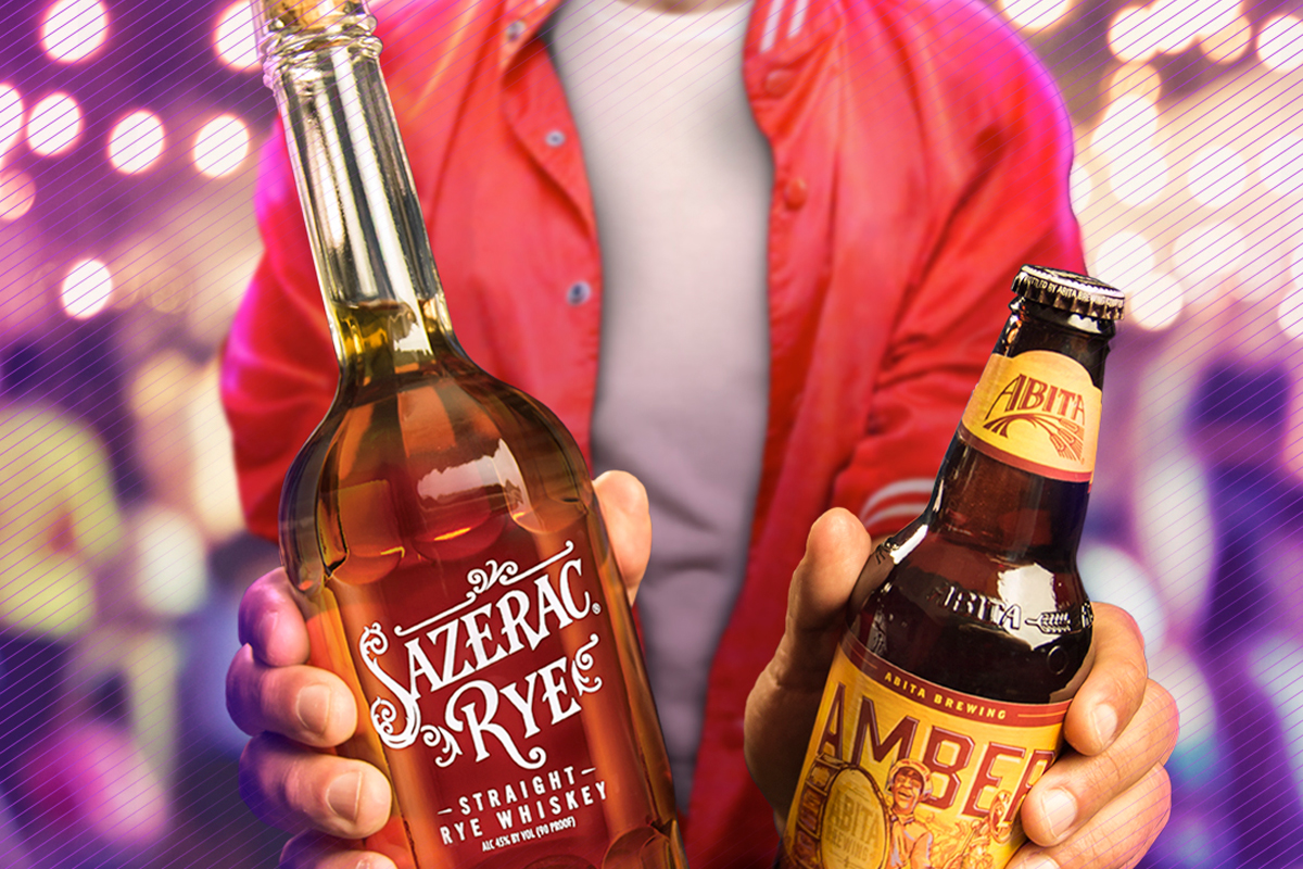 Two Hands Holding Sazerac Rye Whiskey and Abita Amber Beer