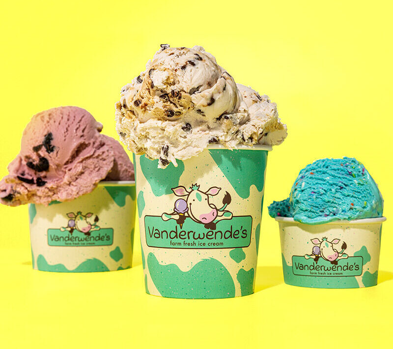 ice cream pints in group on yellow background